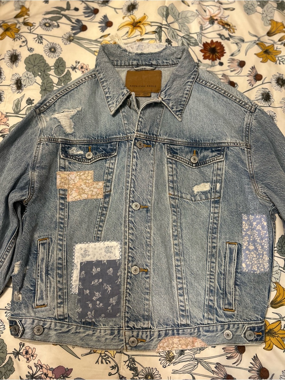 American Eagle Denim Jacket with Cutesy Pattern Patches. Like NEW. Worn once.